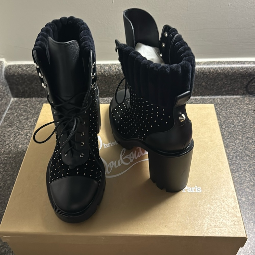 Beautiful brand new never worn Dakita Lug Louboutins size 38.